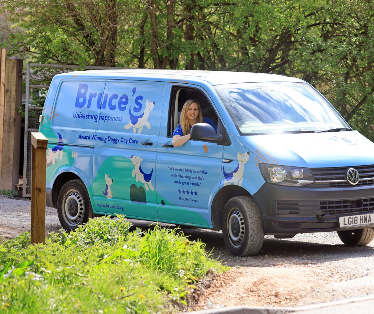 The doggy day care bus and driver arriving at the centre for a day of fun