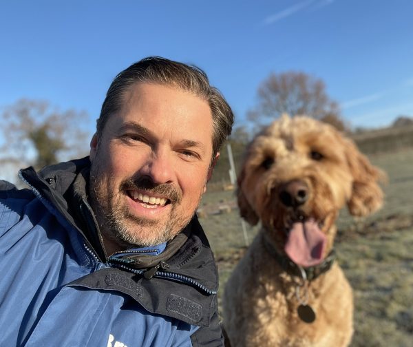 Ben Mann with Bob the cockapoo