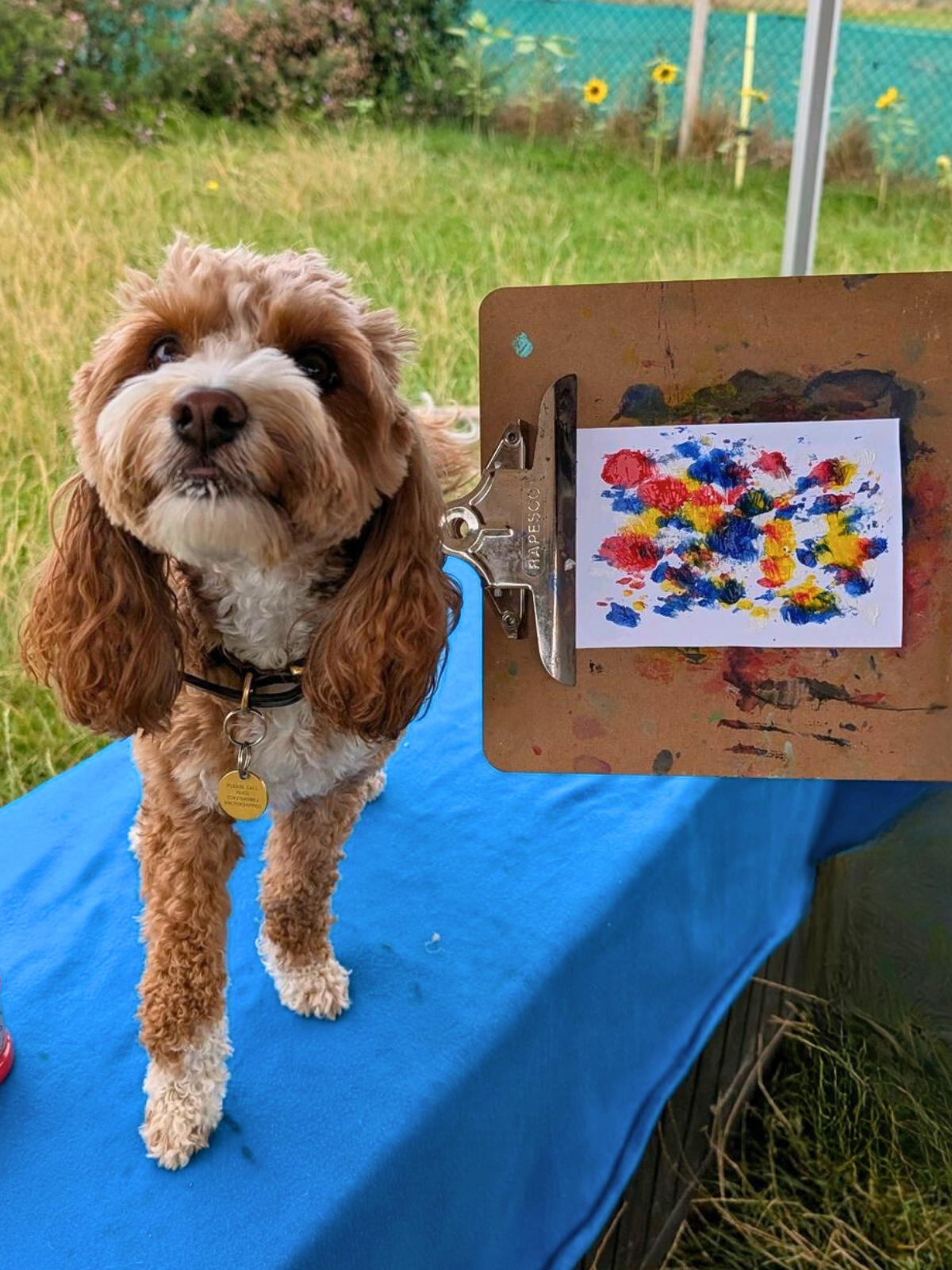 Proud Pup with their Lick Painting